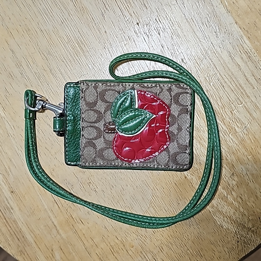 Coach apple lanyard